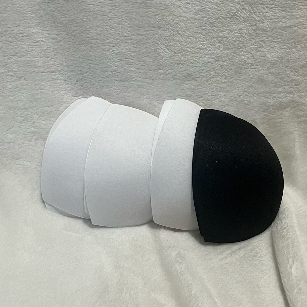 4 Pairs bra liners, new.